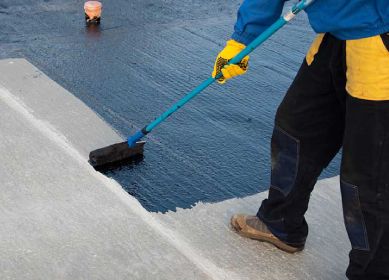 Flat surface waterproofing application using brush roller for leak protection