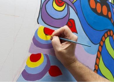 Custom mural painting with vibrant artistic patterns on interior wall